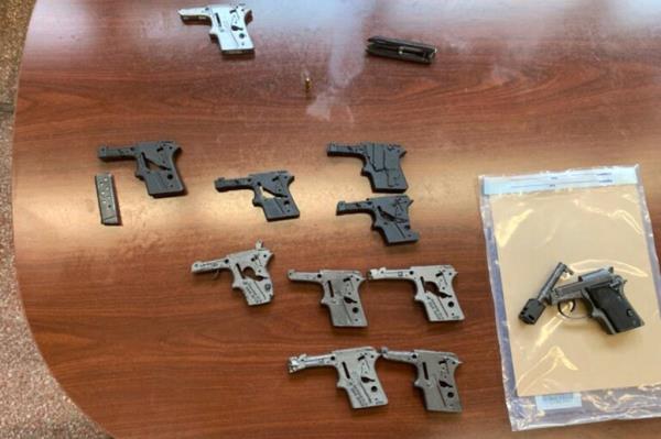 The pile of guns recovered from Guerrero's home.