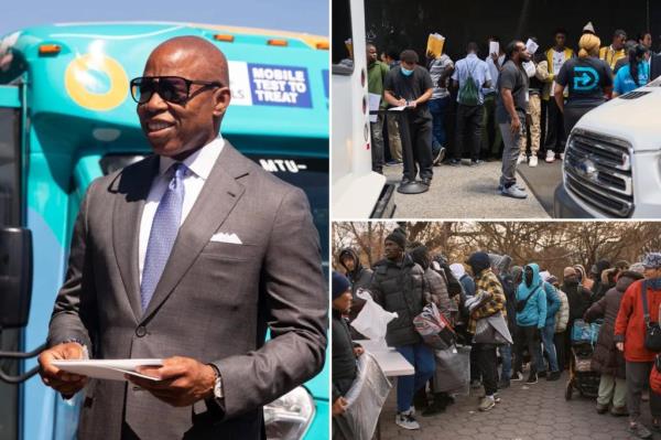 NYC Mayor Eric Adams in a suit and tie standing next to a DocGo bus