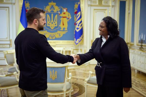 Ukrainian President Volodymyr Zelenskyy meets with Daisy Veerasingham in October.