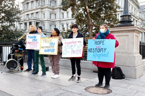 Student loan borrowers and the Too Much Talent Band thank President Joe Biden and Vice President Kamala Harris for extending the student loan pause and now demand that they cancel student debt at a gathering outside The White House on January 13, 2022 in Washington, DC. 