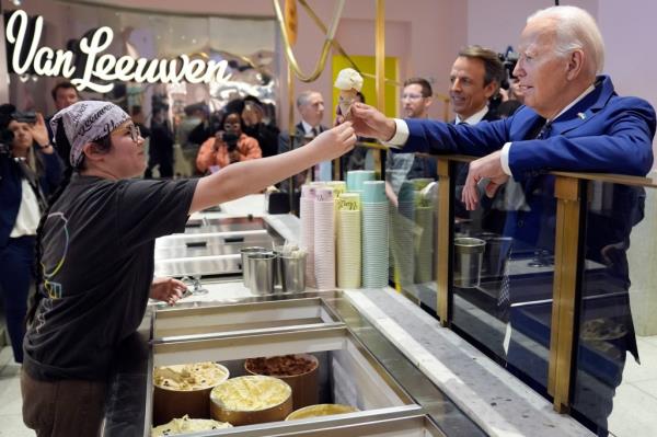 Biden ordering an ice cream cone at Van Leeuwen Ice Cream.