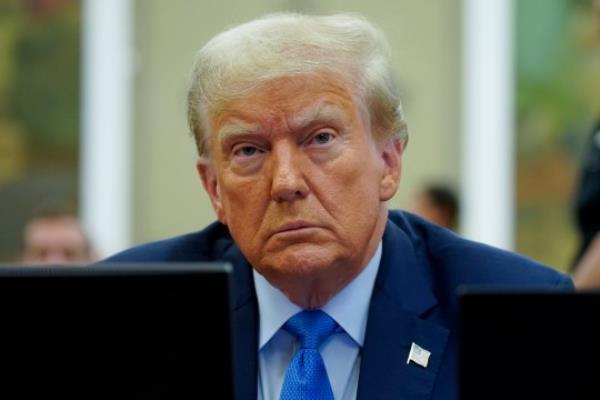 Former President Do<em></em>nald Trump waits to take the witness stand at New York Supreme Court on Monday