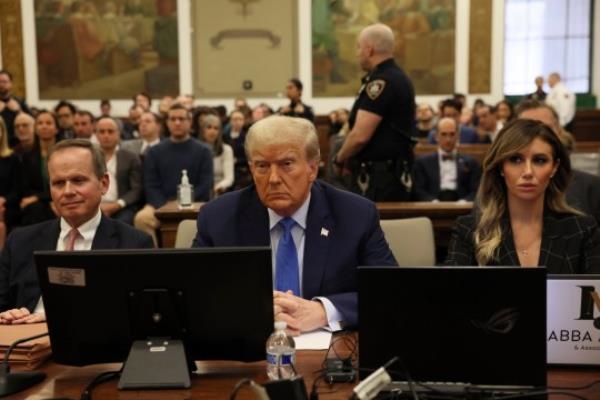 Former President Do<em></em>nald Trump (middle) said that Judge Arthur Engoron will 'rule against me because he will always rule against me'