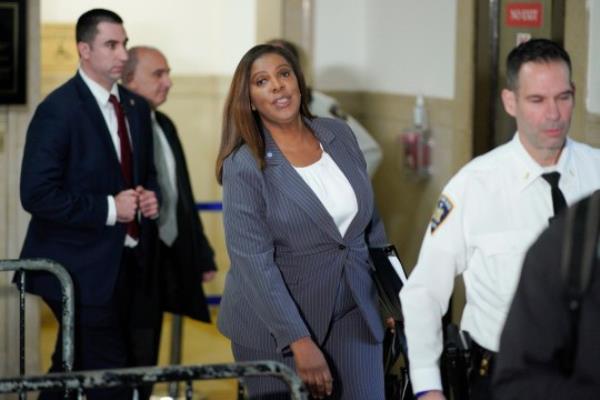 New York Attorney General Letitia James (center) walks out of the courtroom after former President Do<em></em>nald Trump testified at New York Supreme Court