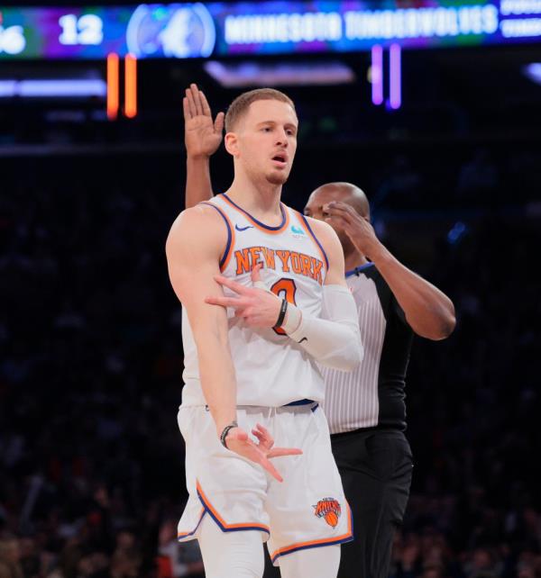 nicks guard Do<em></em>nte DiVincenzo #0 reacts after hitting a three point shot during the first quarter on Monday.
