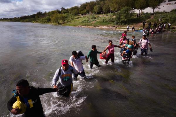 Migrants crossing the US border.