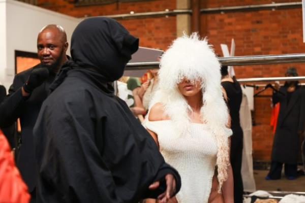 EXCLUSIVE: Premium Exclusive 500GBP WEB SET FEE*PRINT FEES TO BE AGREED Kanye West and wife Bianca Censori attend the Mowalola SS24 Catwalk show as part of Lo<em></em>ndon Fashion Week, in Lo<em></em>ndon UK. 15th September 2023 Kanye comes dressed in all black wearing a balaclava type face covering. Bianca comes wearing a leotard and wig covering part of her face that looks like sheeps wool. Pictured: Kanye West,Bianca Censori Ref: SPL9919984 150923 EXCLUSIVE Picture by: Lensi Photography / SplashNews.com Splash News and Pictures USA: 310-525-5808 UK: 020 8126 1009 eamteam@shutterstock.com World Rights