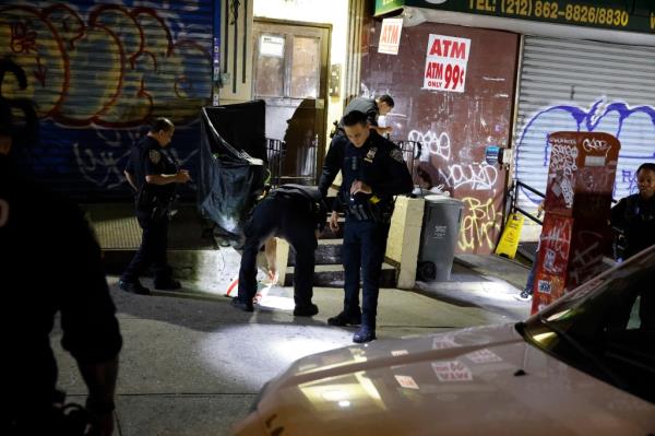NYPD respo<em></em>nds to the scene wher<em></em>e a 33-year-old man was grazed in the shoulder on Amsterdam Avenue near West 133rd Street around 4:30 a.m.