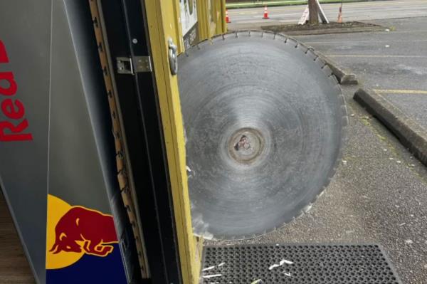 saw blade lodged in building