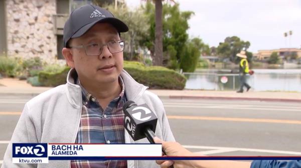Bystander Bach Ha being interviewed