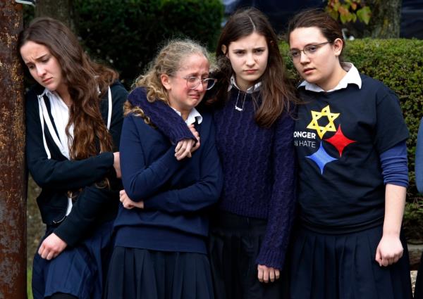 Students from the Yeshiva School near Pittsburgh pay their respects for one of the victims who died in the shooting.