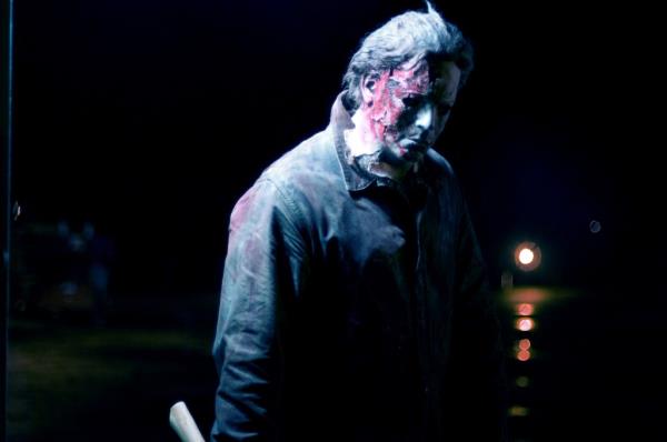 Michael Myers with his face covered in blood