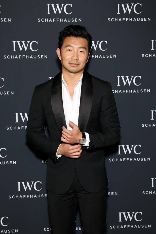 Simu Liu smiling. 