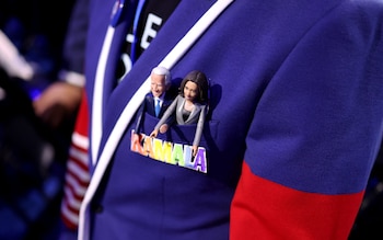 Joe Biden and Kamala Harris are pictured inside the pocket of the jacket of a California delegate on the first day of the Democratic Natio<em></em>nal Convention