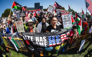 The March on the DNC protest group rallies in downtown Chicago ahead of a march on the United Centre