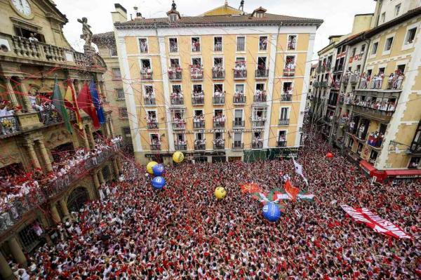 People crowded outside of the Town Hall of Pamplona, Spain for the beginning of the San Fermin bull festival on July 6, 2023.