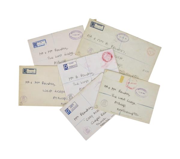 A photo of stamped cards addressed to Diana's housekeeper, Maud Pendrey