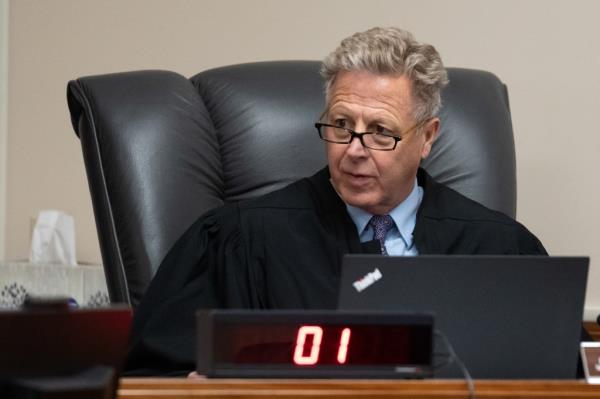 Second District Judge John C. speaking at a courtroom hearing for murder suspect Bryan Kohberger in Latah County District Court, Idaho