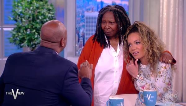 Sen. Tim Scott (R-SC), left, speaks with 'The View' co-hosts Whoopi Goldberg, center, and Sunny Hostin, right