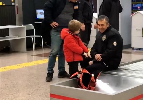 Police searching bag of a 6-year-old child at Bursa Airport, Turkey