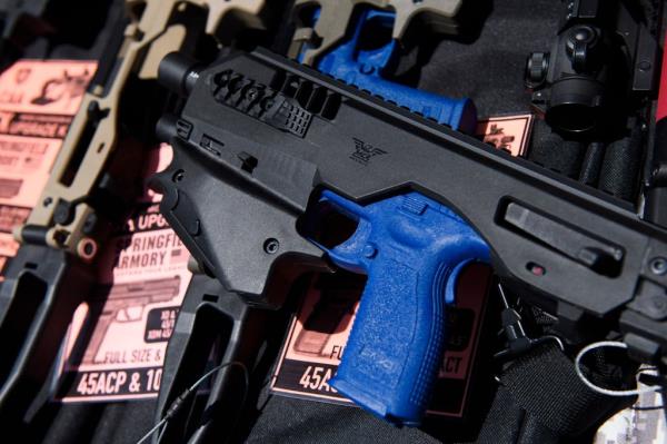 A MCK pistol brace for a handgun is displayed  at the Crossroads of the West Gun Show at the Orange County Fairgrounds on June 5, 2021 in Costa Mesa, California.