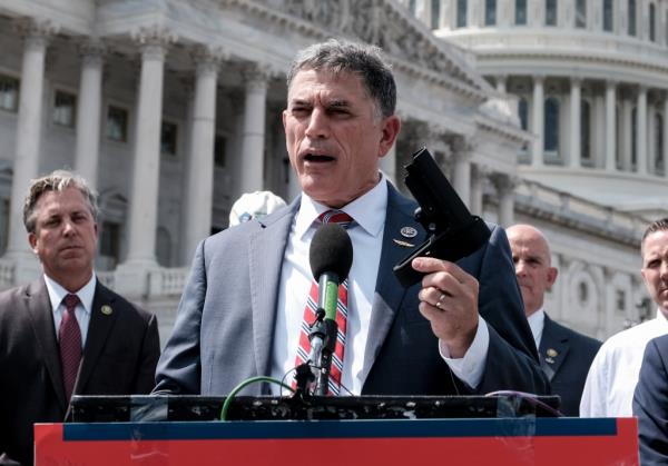 Rep. Andrew Clyde (R-GA) holds a pistol brace as he speaks to the press during a press co<em></em>nference on Capitol Hill on June 13, 2023 in Washington, DC.
