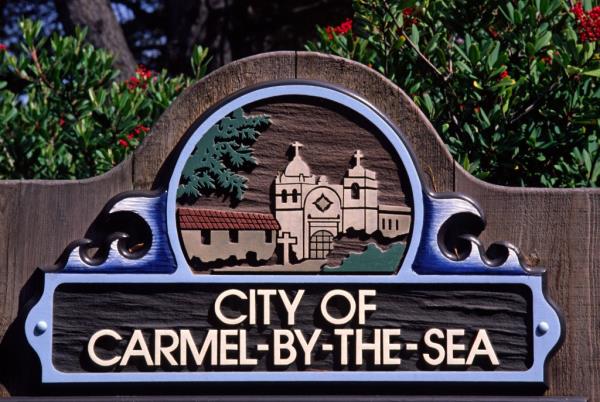 Carved Wooden Sign Of The City Of Carmel Depicting The Carmel Mission, California. 