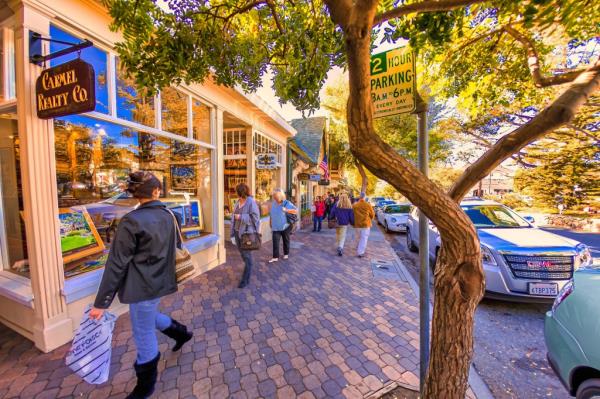 People shopping on Main Street of Carmel.