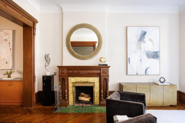 Details include fireplaces and handsome wood trims.