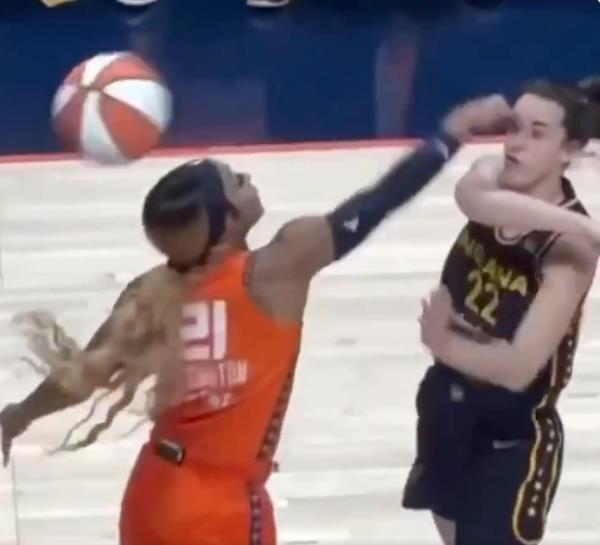 Dijo<em></em>nai Carrington poking Clark in the eye.