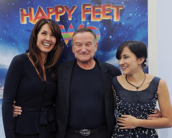 Robin Williams with wife Susan Schneider (L) and daughter Zelda Williams.