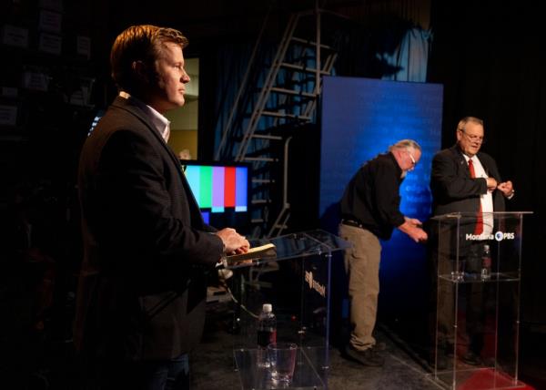Tim Sheehy, left, prepares to debate U.S. Sen. Jon Tester, right, on campus at the University of Mo<em></em>ntana in Missoula, Mont., Monday, Sept. 30, 2024. 