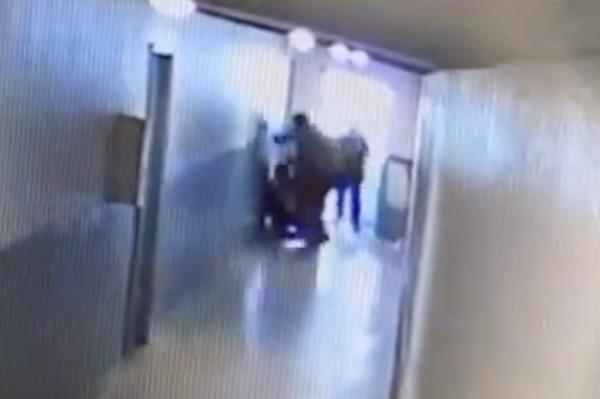Video footage from one of the apartment security cameras, capturing part of the assault on a CBZ Management employee.