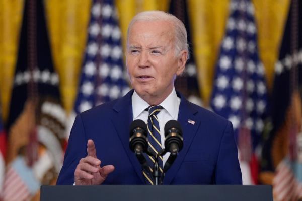 President Joe Biden speaking at a podium in the East Room of the White House on June 4, 2024.