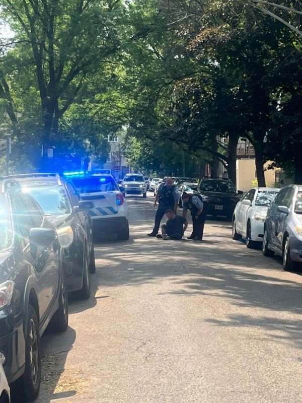 Williams shared a snap of the officers detaining the intruder in the middle of the street following their chase.