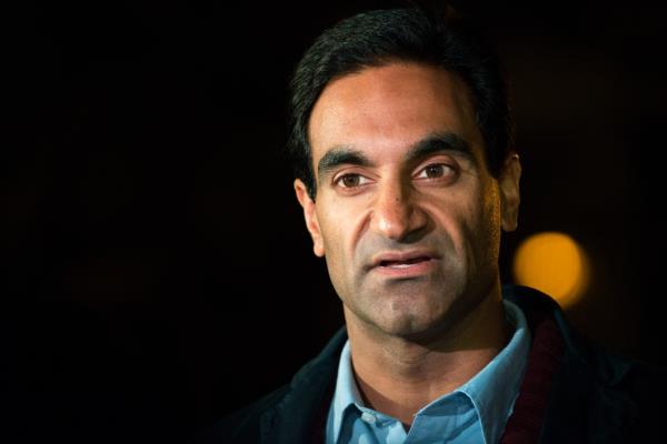 : Deputy Commissio<em></em>ner of the New York City Health Department Dr. Jay Varma speaks at a press co<em></em>nference in front of 546 West 147th Street on October 25, 2014 in New York City. 
