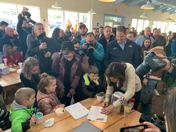 Nikki Haley greets children eating ice cream during a campaign stop at the Beach Plum ahead of the New Hampshire primary election in Epping, New Hampshire, U.S., January 21, 2024