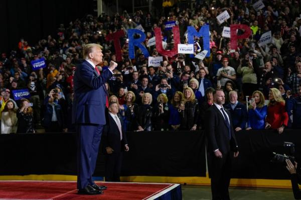 Republican presidential candidate former President Do<em></em>nald Trump gestures to the crowd during a campaign event in Manchester, N.H., Saturday, Jan. 20, 2024