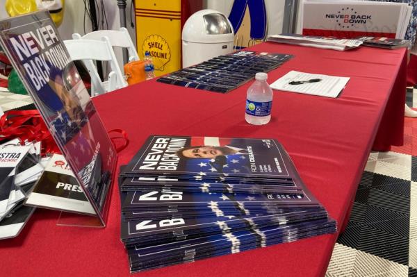 The super PAC promoting Florida Gov. Ron DeSantis displays information sign-up sheets and pledge cards for Iowans attending a Republican Iowa co<em></em>ngressional fundraiser DeSantis headlined on May 13, 2023, in Sioux Center, Iowa.