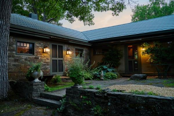 The single story home comes with a roof made of zinc shipped from England 