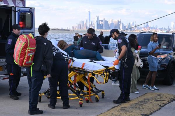 Two men were stabbed and another was injured by a bottle after a fight broke out at a Brooklyn party boat on Saturday. 