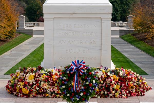 A wreath placed by President Joe Biden rests in front of the Tomb of the Unknown Soldier after a centennial ceremony, in Arlington Natio<em></em>nal Cemetery, on November 11, 2021, in Arlington, Virginia
