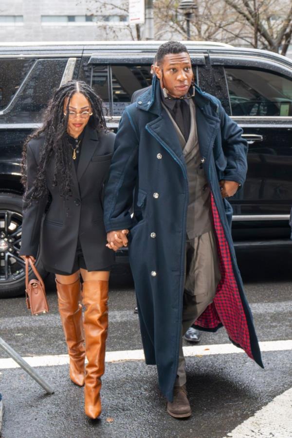 Meagan Good and Jo<em></em>nathan Majors enter court for his trial for assault