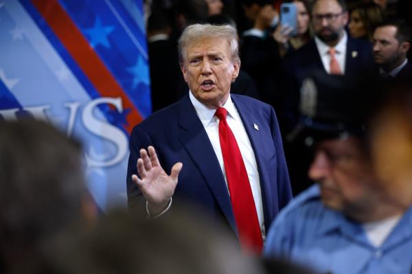 Republican presidential nominee, former President Do<em></em>nald Trump talks to journalists in the spin room after he debated Democratic presidential nominee, U.S. Vice President Kamala Harris at The Natio<em></em>nal Co<em></em>nstitution Center on September 10, 2024 in Philadelphia, Pennsylvania