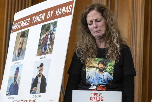 Doris Liber, whose son Guy Iluz is being held hostage in Gaza, holds in her emotions during a press co<em></em>nference with House Republicans at the Capitol