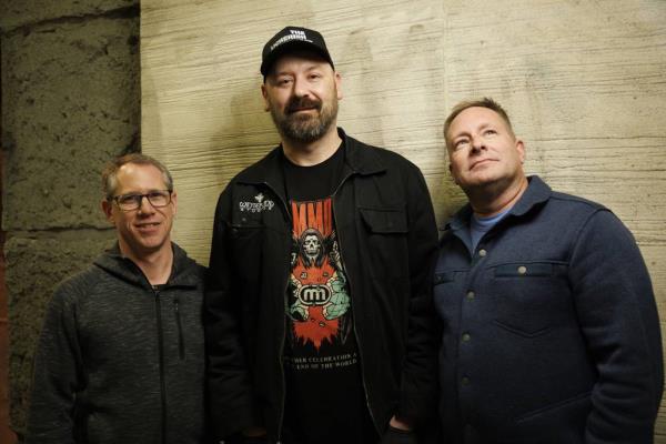Daryll Hurst, from left, and Luke and Bryan Hartjes at the Auditorium Theatre before attending Geddy Lee's book tour.