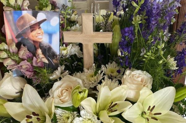 a floral tribute for Nikki Coats 