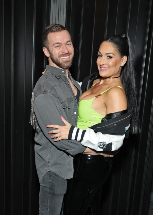 Artem Chigvintsev and Nikki Bella at the live 