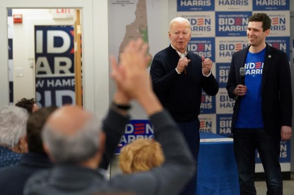 U.S. President Joe Biden reacts during a visit to his campaign field office in Manchester, New Hampshire, U.S., March 11, 2024.  