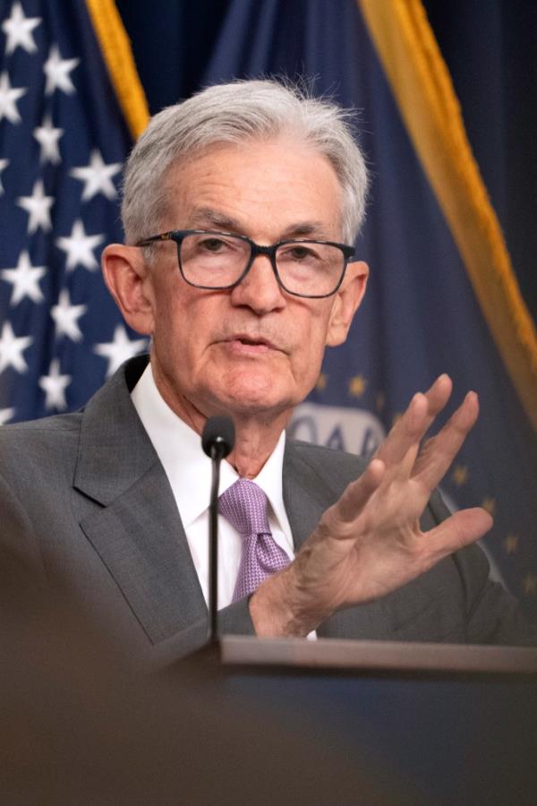 US Federal Reserve Chairman Jerome Powell speaking at a news co<em></em>nference after a Federal Open Market Committee meeting, announcing plans for cutting interest rates.